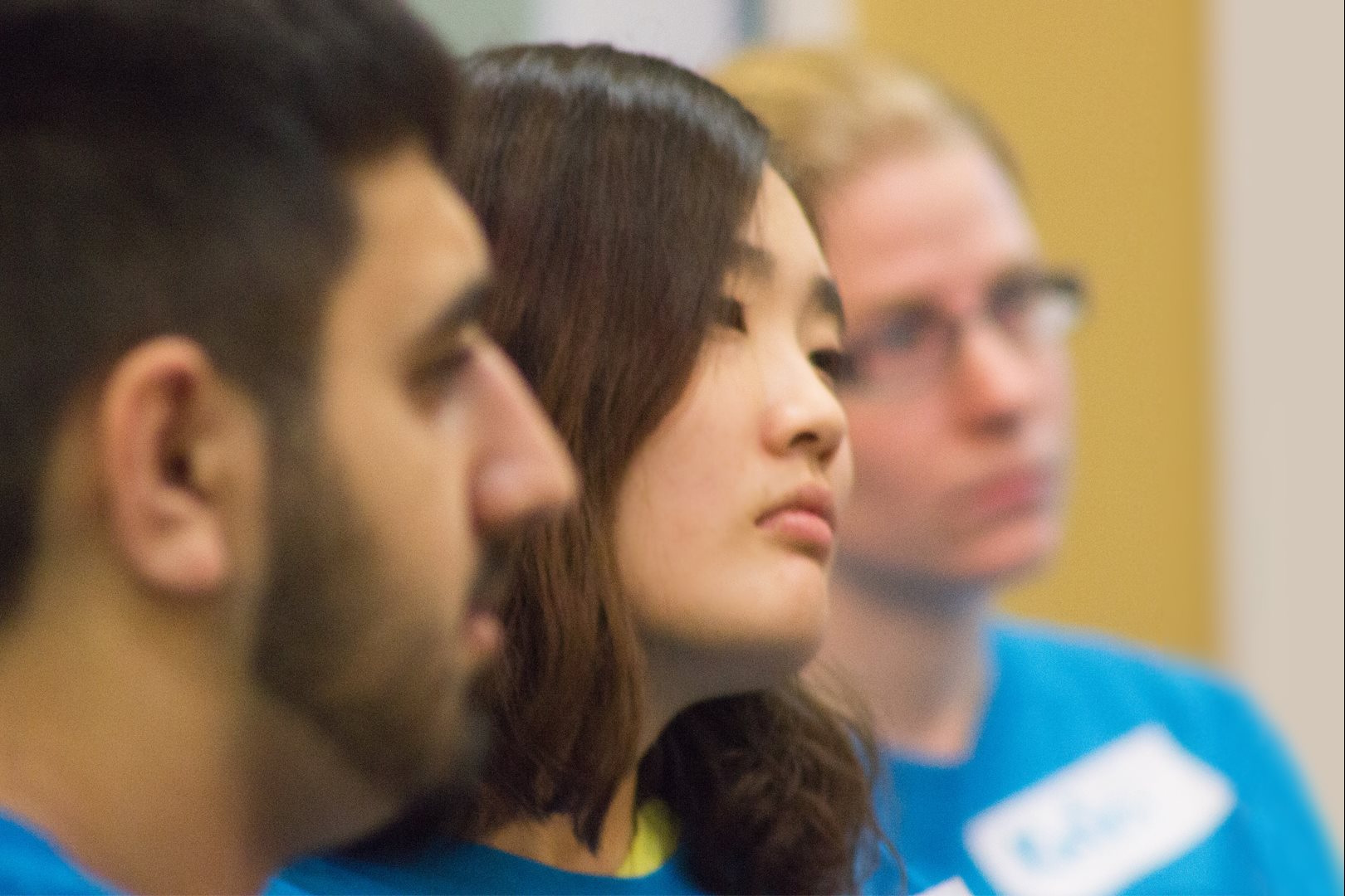 Three students at a service learning session